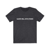 SLEEPS WELL WITH OTHERS - Unisex Soft Cotton T-shirt